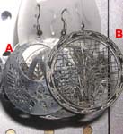 A: Huge circular fish hook earring with garden scene design