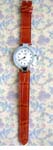 Accessory gift supply import dealer wholesales Womens classic watch with thin, red faux leather band and silver plated clock frame from China