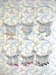 Hair care China manufactured distribution factory. Ladies accessory with cz gemstone charms dangling between silver plated beads