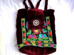 China handmade teen accessory B2B trade agency exports Black knap sack style handbag with colorful embroidery design