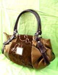 Womens wholesale store supplier. Sequin fashion design on imitation leather and suede handbag with double handles, decorative straps on sides with buckle holding to bag
