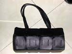 Wholesale discount handbag fashion shopping catalog. Black PVC purse with zippered pocket short shoulder strap and has imitation leather square design on front