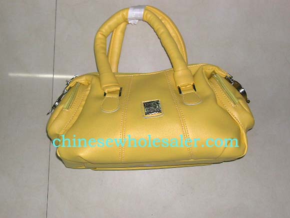 China direct wholesale womens purse distributors. Yellow imitation leather handbag with comfortable double handles and two zip up pouchs on either side for cell phone or change..    