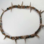 collection of hematite necklaces in different shapes, sizes and styling