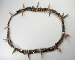 collection of hematite necklaces in different shapes, sizes and styling