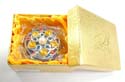 Round enamel jewelry box motif filigree flower holding 5 orange shiny beads and a pearl bead inlaid on lid with pinky flower decor around, enamel in purple color