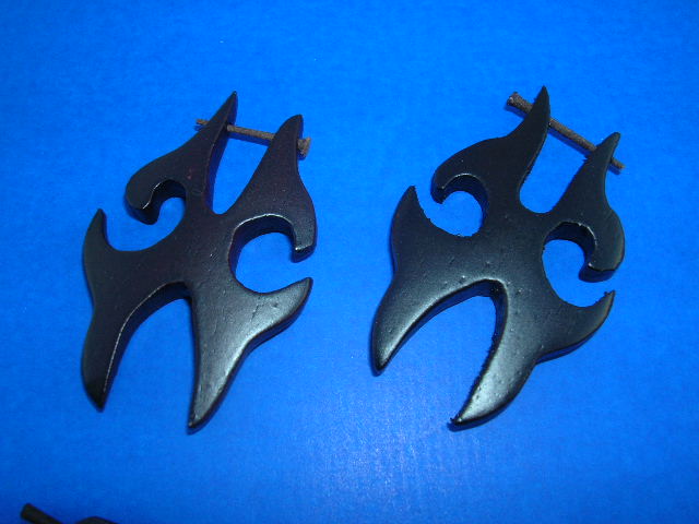 Jewellery distribution company. Quality natural wooden earrings in X shape