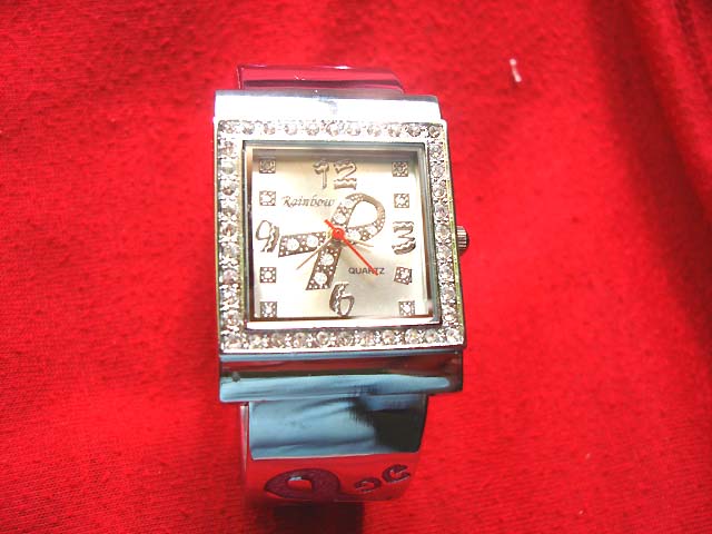 Wholesale fashion catalog - Elegant silver watch with cancer ribbon sign in clock face and gemstone frame 