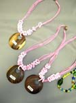 Girls pink multi cord necklace with coiled bead work and tribal moon designed wood pendant  from bali bali manufacturer outlet store