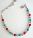 Fashion beaded bracelet in combination of rounded imitation turquoise / coral beads with lobster claw clasp 
