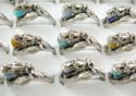 Fashion dragon ring holding colored rounded cat eye bead in the mouth