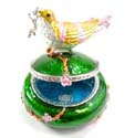 Enamel green jewelry box motif bird figure standed on tree stick holing a cz cherry in a mouth with enamel in gold and pink color