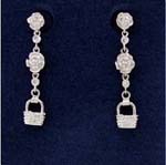 Cz factory exchange importer distributes wholesale jewelry. Rhodium plated blaskets hanging from two flower shapes seperated by cz ston