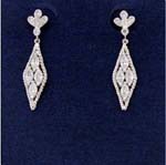 Wholesale to retail fashion jewelry dealers selling Fashionable earings with four cz stones within a hollow rhodium plated diamond frame and three leafed cz clover for stud.