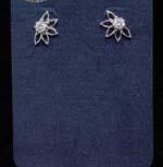 Costume jewelry sold online for wholesale price. Five petaled flower with cut out petals and cz stone center