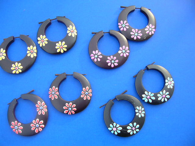 Spring design organic wood hoop earrings with painted flower theme. Ladies accessory wholesaler