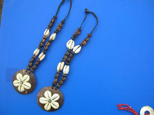 Bali bali seashell flower designed wooden pendant on shell and wood bead necklace. International supply express