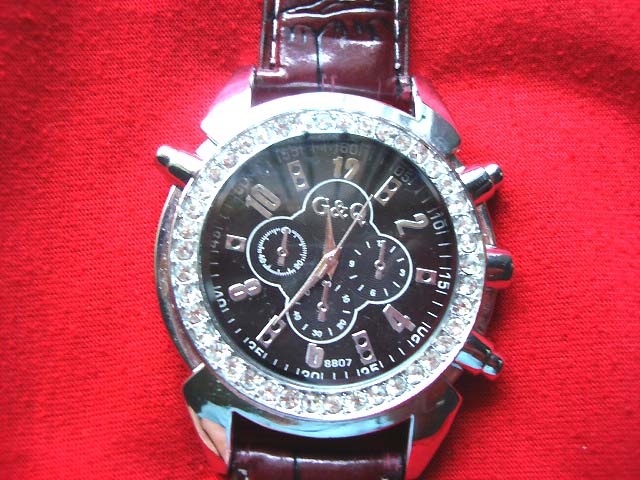 Traditional styled mens sport watch with burgundy imitation leather strap - retail supply exchange