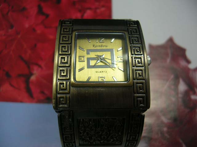 Crafted jewelry collection company - Copper bangle bracelet watch with squared spiral design