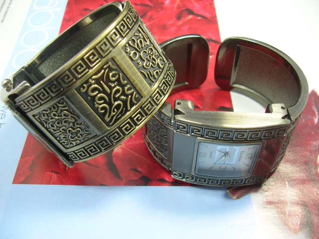 Crafted jewelry collection company - Copper bangle bracelet watch with squared spiral design