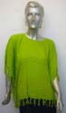 Beaded fringe poncho in solid color design