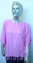 Beaded fringe poncho in solid color design
