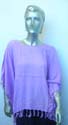 Beaded fringe poncho in solid color design