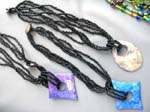 Designer wear factory outlet shopping dealer, Beautifully crafted stone pendant with hollowed out center held by black bead string necklace