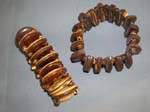 Stylish jewellery online shopping, Handmade wooden beads separating oval charms on ladies stretchy fashion bracelet 