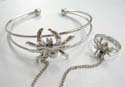 Fashion jewelry slave bangle bracelet-ring in carved-out double band design with giant spider pattern decor at center 